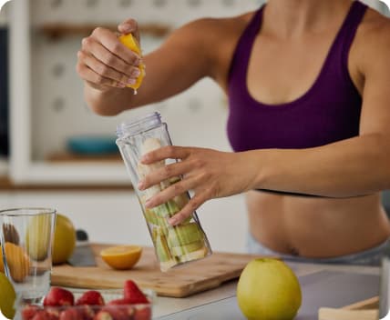 A woman making smoothie